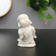 NAQSH MONK WITH MALA IN RIGHT HAND, POLYRESIN HAND FINISHED FIGURINE WHITE BY LIVNG ESSENCE - HomeTown