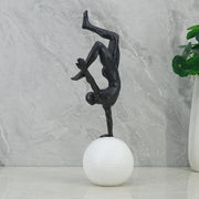 Willow Polyresin Man Balancing On Ball 30Cm in Black And White Colour - HomeTown