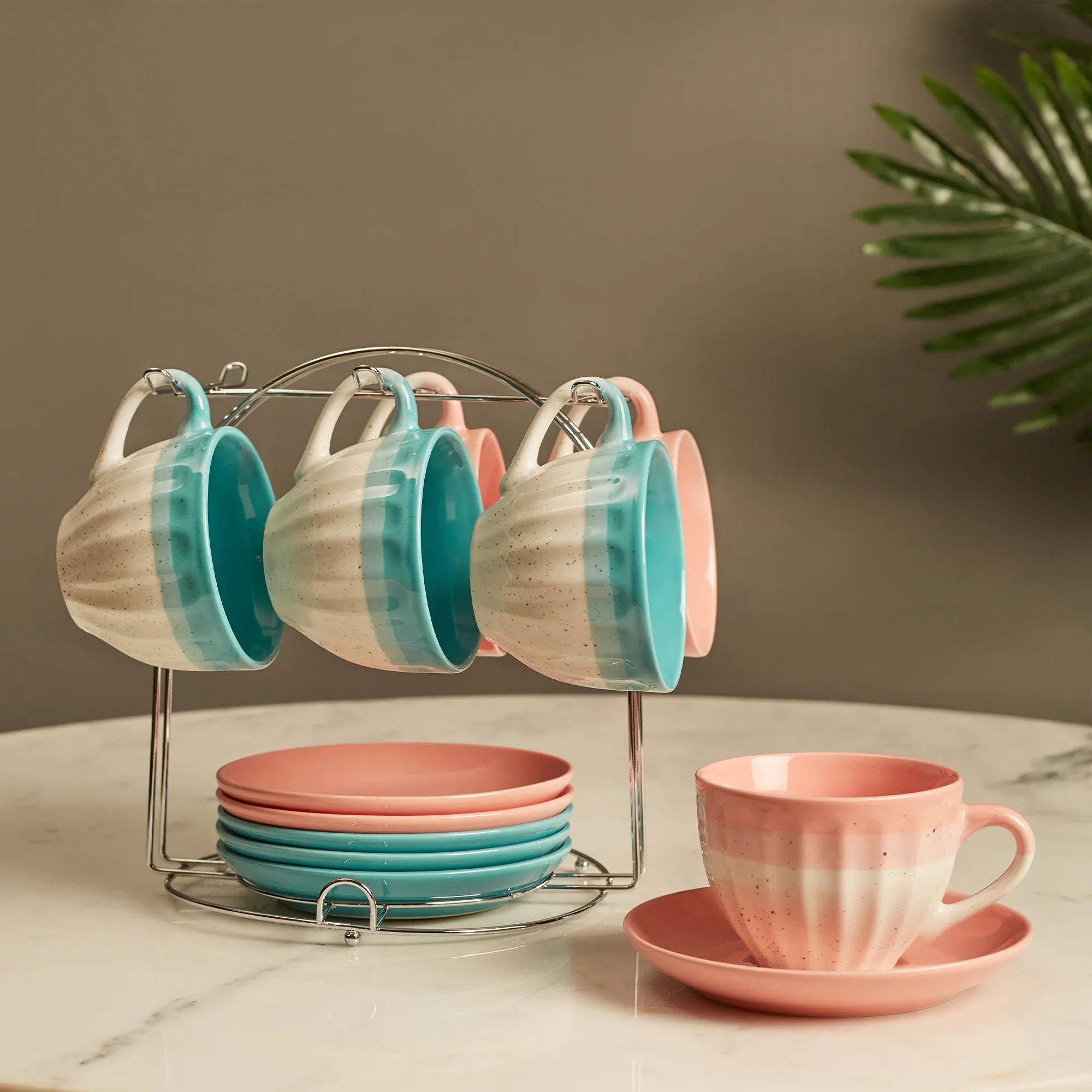 Emilia Ceramic Cup & Saucer Set Of 12 With Metal Stand in Blue & Pink Colour - HomeTown