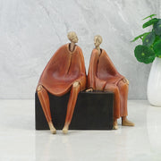 Alpine Polyresin Men Sitting On Bench 18 Cm in Brown Colour - HomeTown