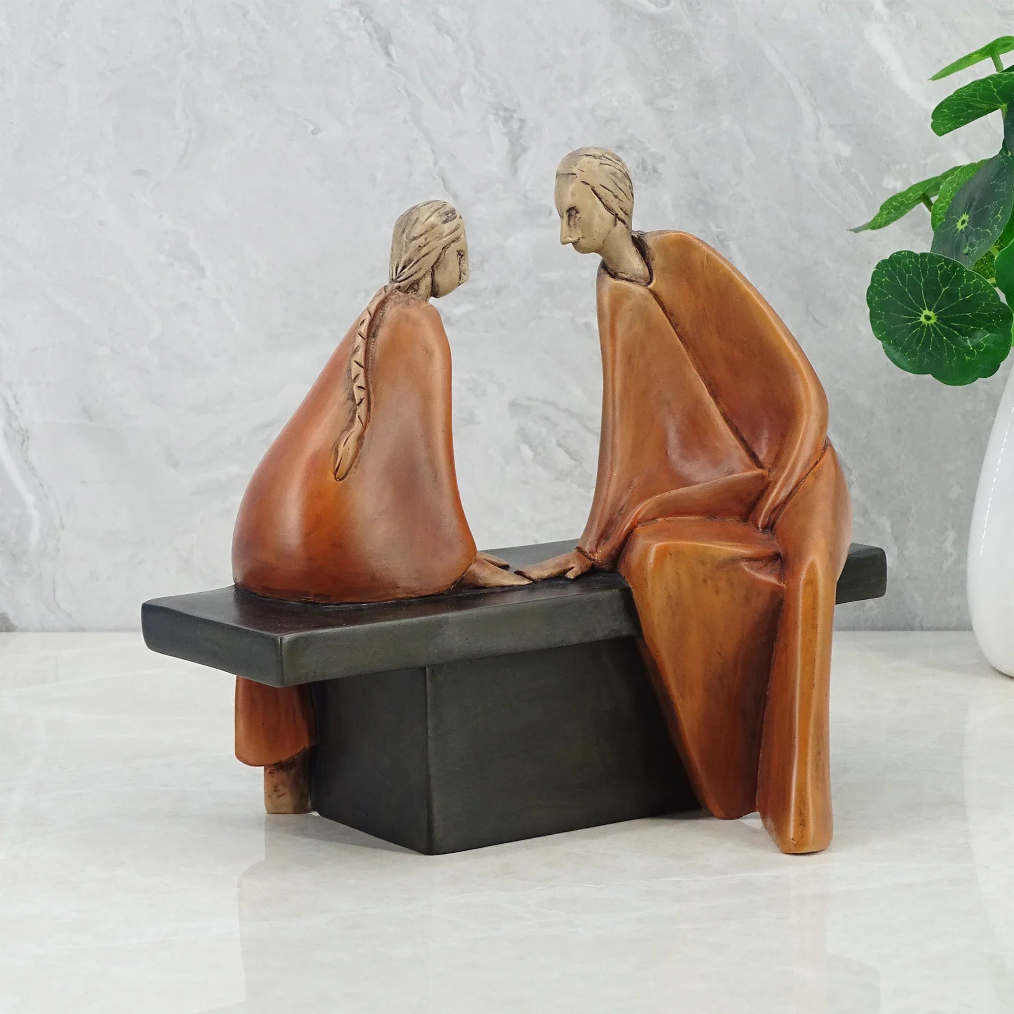 Alpine Polyresin Couple Sitting On Bench 18 Cm in Brown Colour - HomeTown