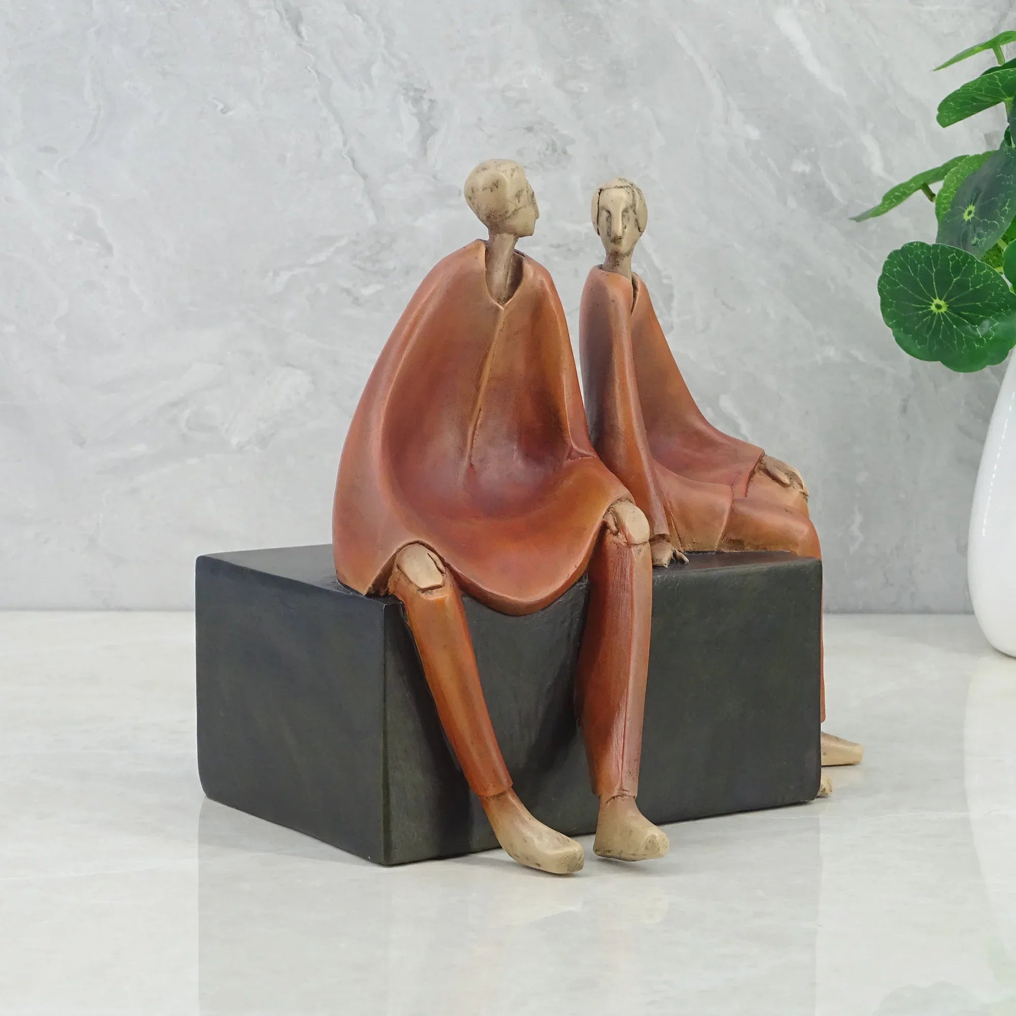 Alpine Polyresin Men Sitting On Bench 18 Cm in Brown Colour - HomeTown