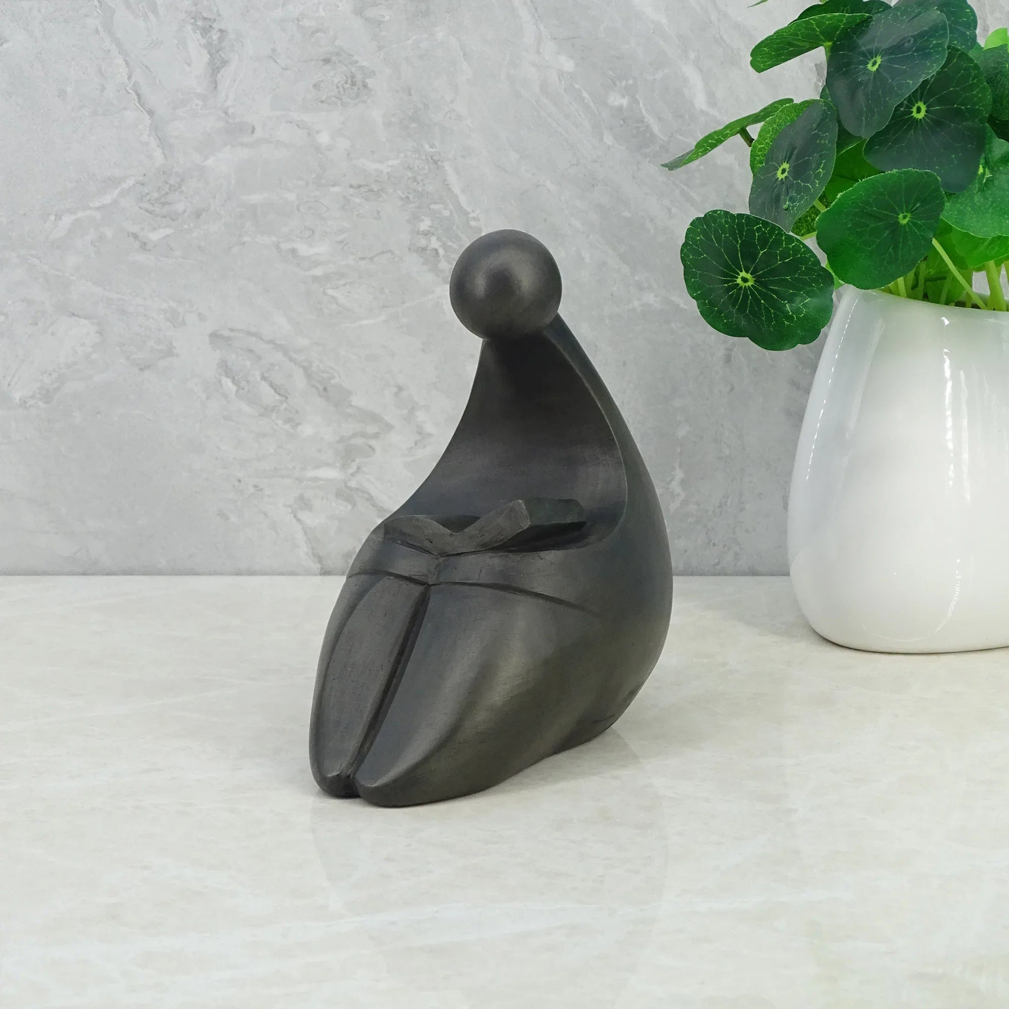 Noire Polyresin Man Reading Book 15 Cm in Black Colour - HomeTown