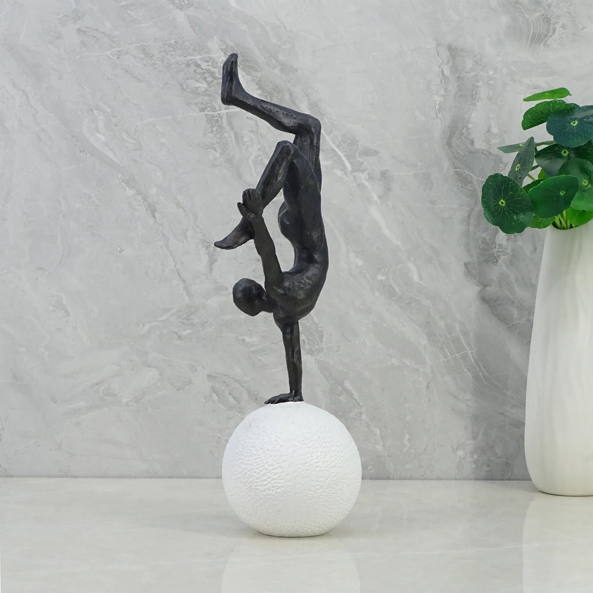 Willow Polyresin Man Balancing On Ball 30Cm in Black And White Colour - HomeTown
