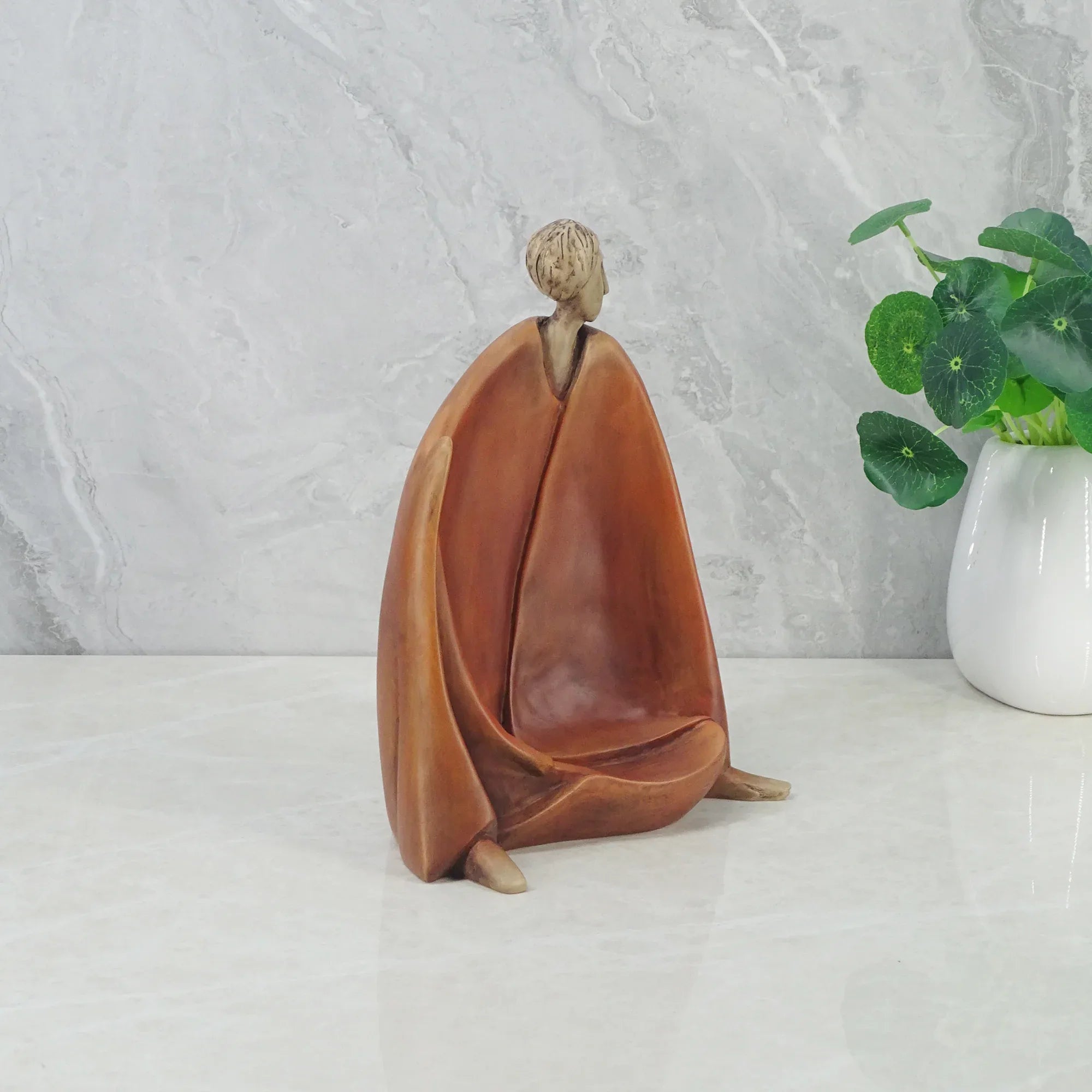 Alpine Polyresin Man Sitting Figurine 18x14x23Cm in Brown Colour - HomeTown