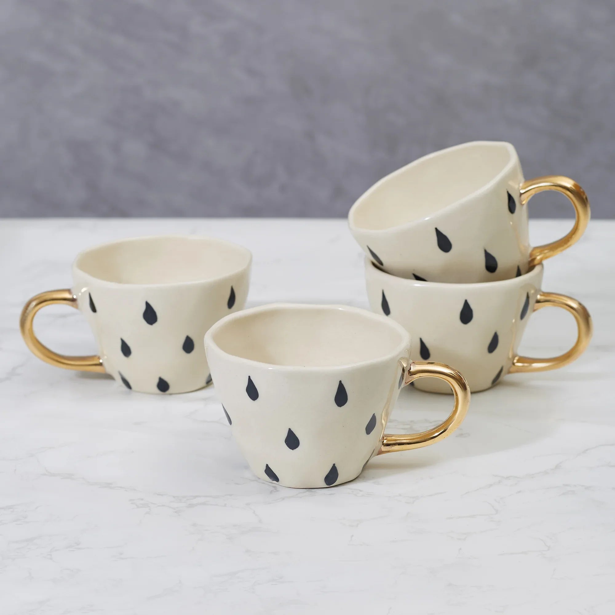 Fiesta Studio Pottery Droplet Tea Mug 250 ML Set of 4 with Real Gold Plating in Black & White Colour - HomeTown