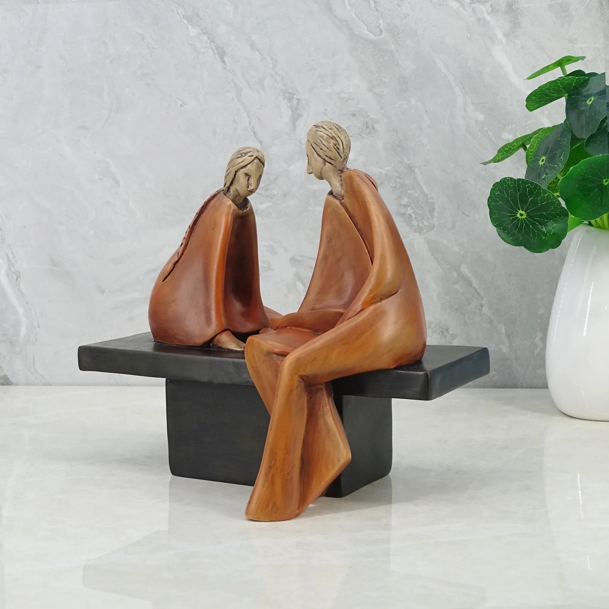 Alpine Polyresin Couple Sitting On Bench 18 Cm in Brown Colour - HomeTown