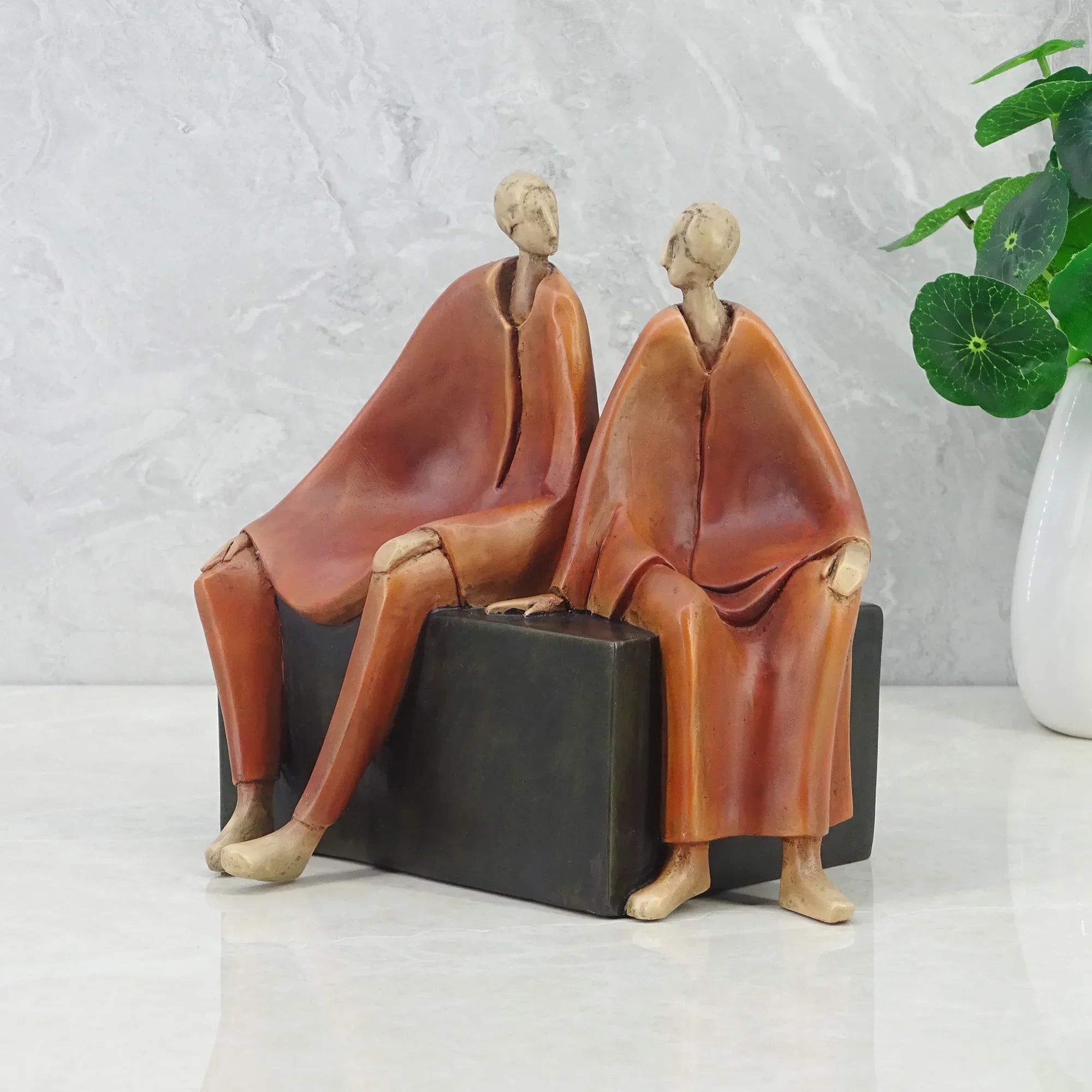 Alpine Polyresin Men Sitting On Bench 18 Cm in Brown Colour - HomeTown
