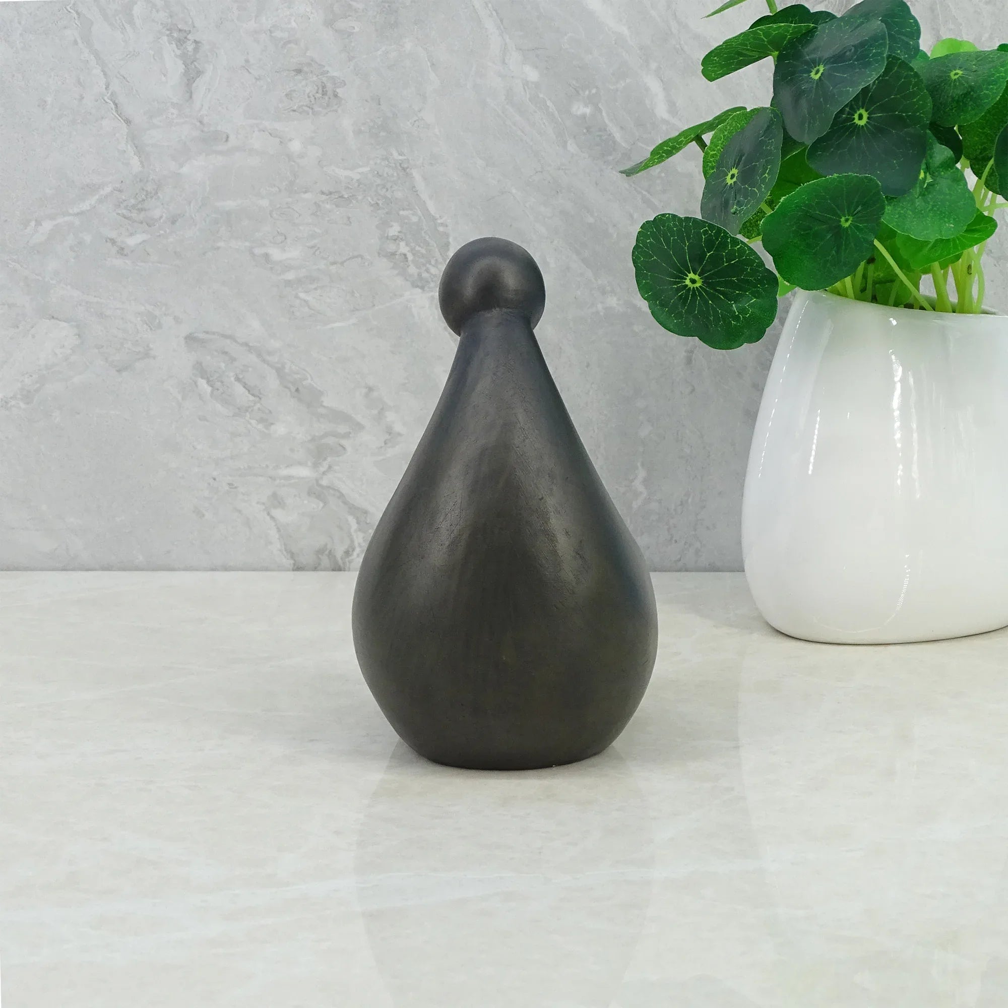 Noire Polyresin Man Reading Book 15 Cm in Black Colour - HomeTown