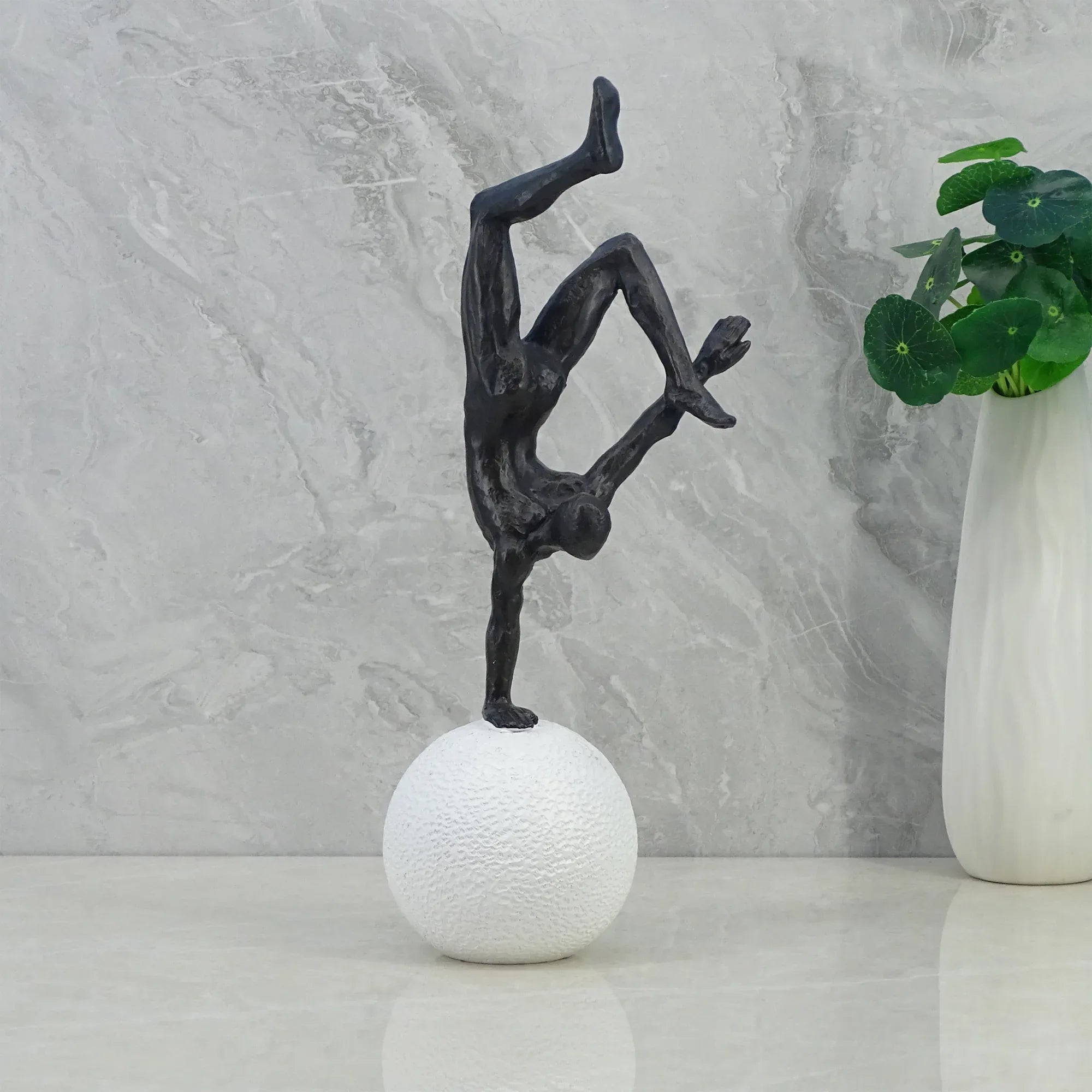Willow Polyresin Man Balancing On Ball 30Cm in Black And White Colour - HomeTown
