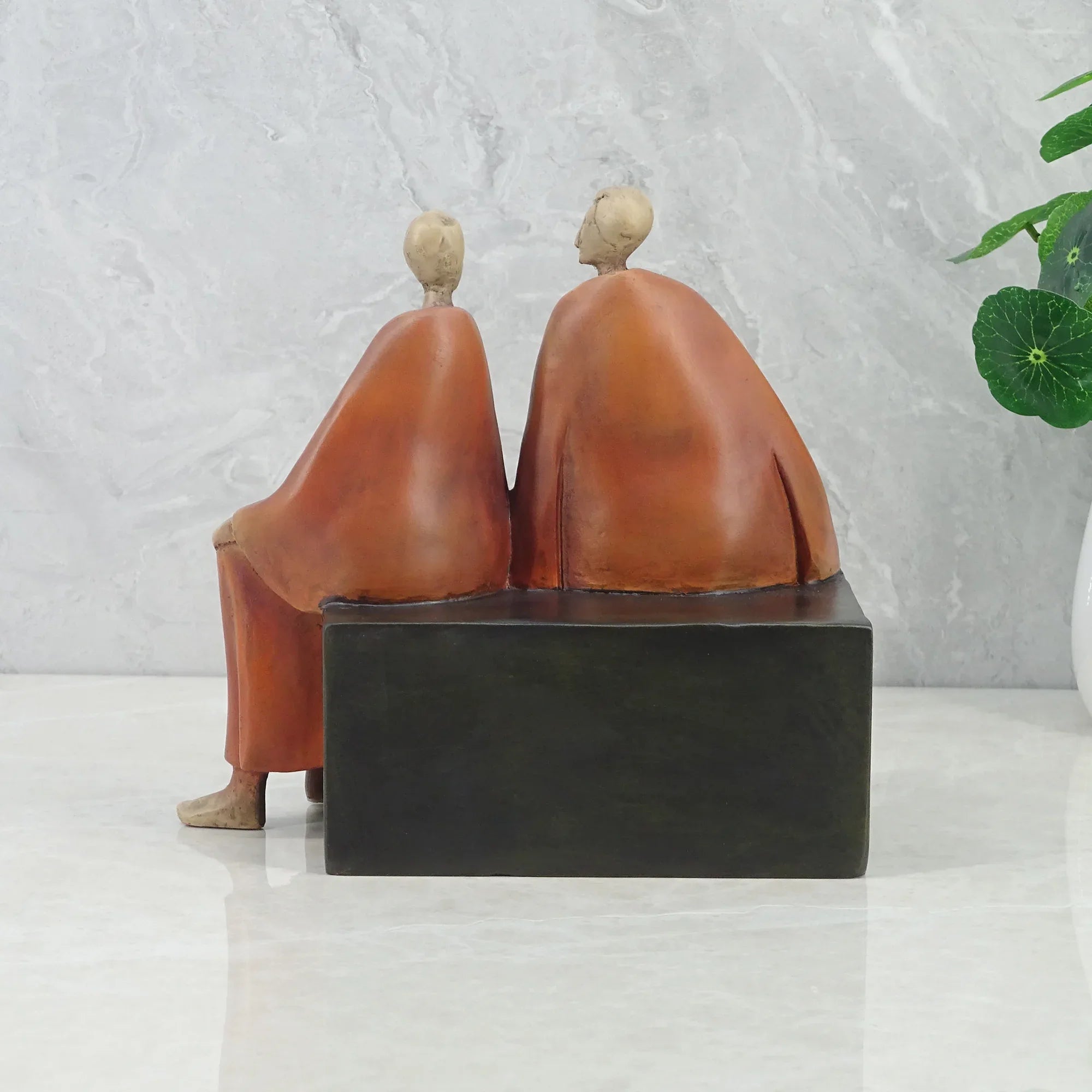 Alpine Polyresin Men Sitting On Bench 18 Cm in Brown Colour - HomeTown