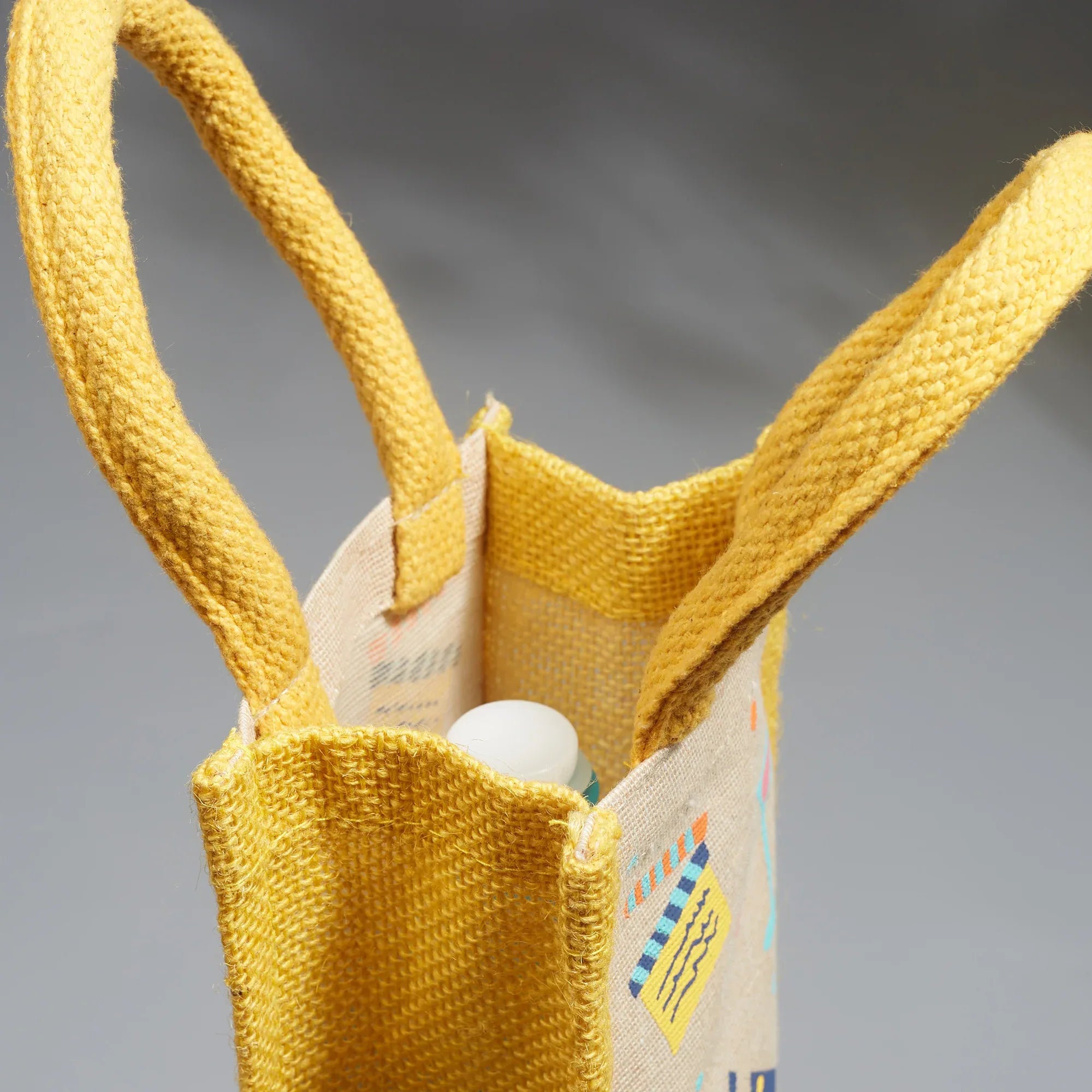 Good Life Jute Reversible Dessert Printed Bottle Bag 12 x 35.5 Cm in Yellow Colour - HomeTown
