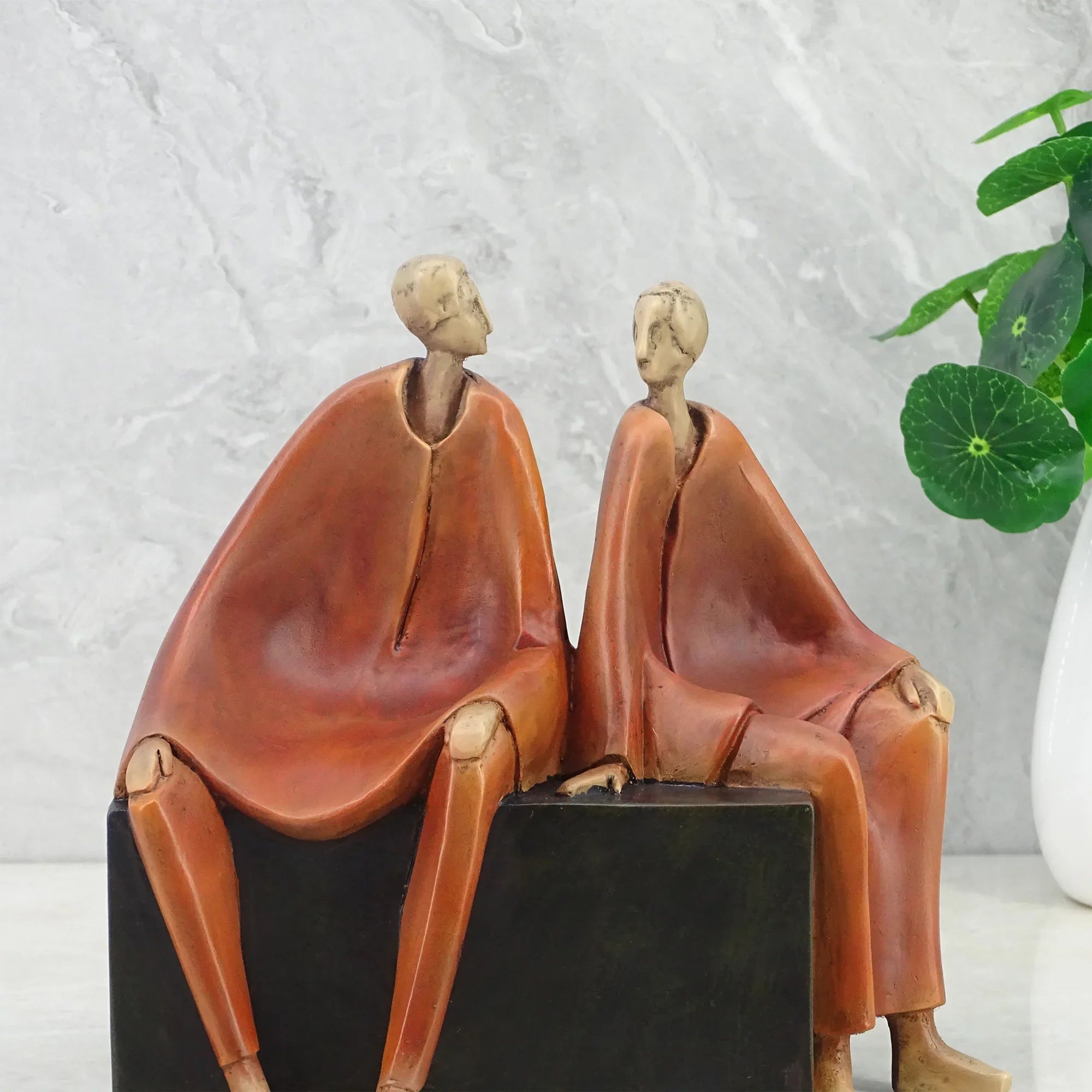 Alpine Polyresin Men Sitting On Bench 18 Cm in Brown Colour - HomeTown