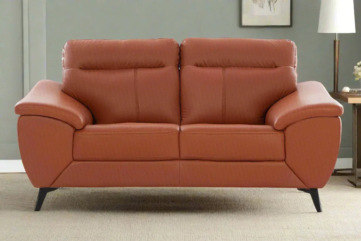 Genova Leatherette Sofa In Tan Color - HomeTown